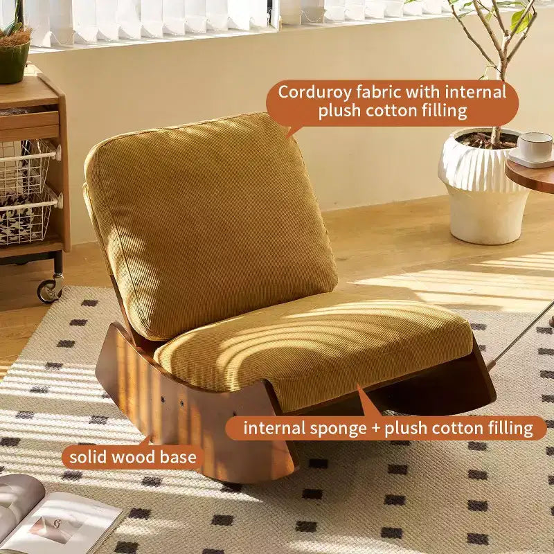 Poltrona a dondolo Glider con struttura in legno e rivestimento in velluto a coste