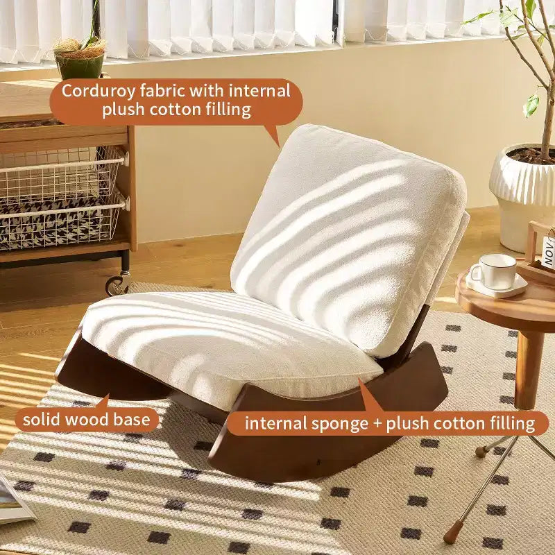Poltrona a dondolo Glider con struttura in legno e rivestimento in velluto a coste