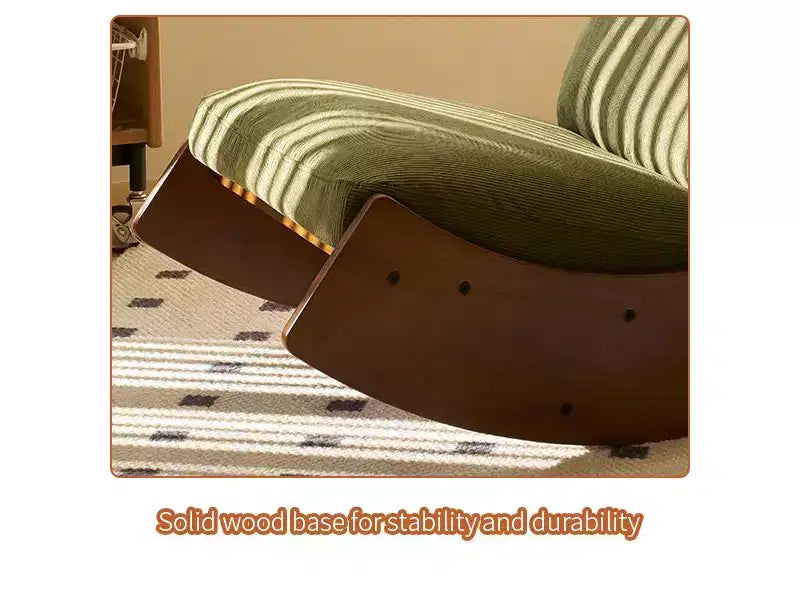 Poltrona a dondolo Glider con struttura in legno e rivestimento in velluto a coste
