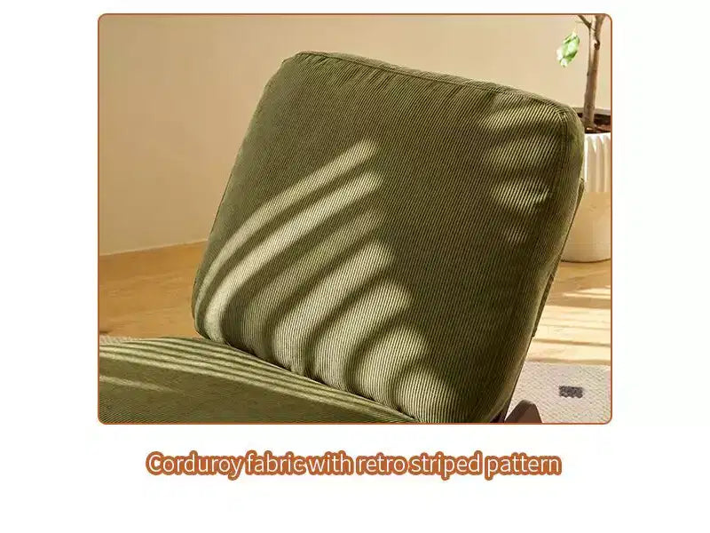 Poltrona a dondolo Glider con struttura in legno e rivestimento in velluto a coste