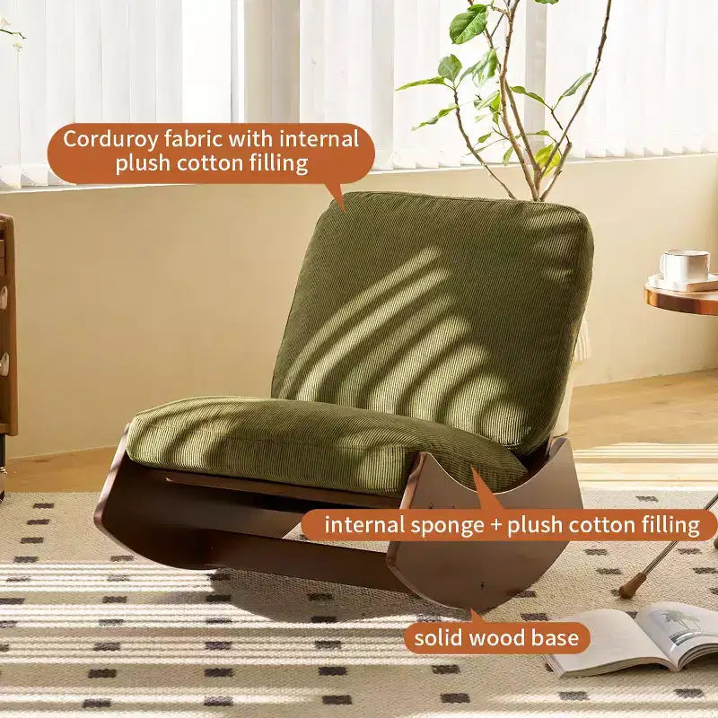 Poltrona a dondolo Glider con struttura in legno e rivestimento in velluto a coste