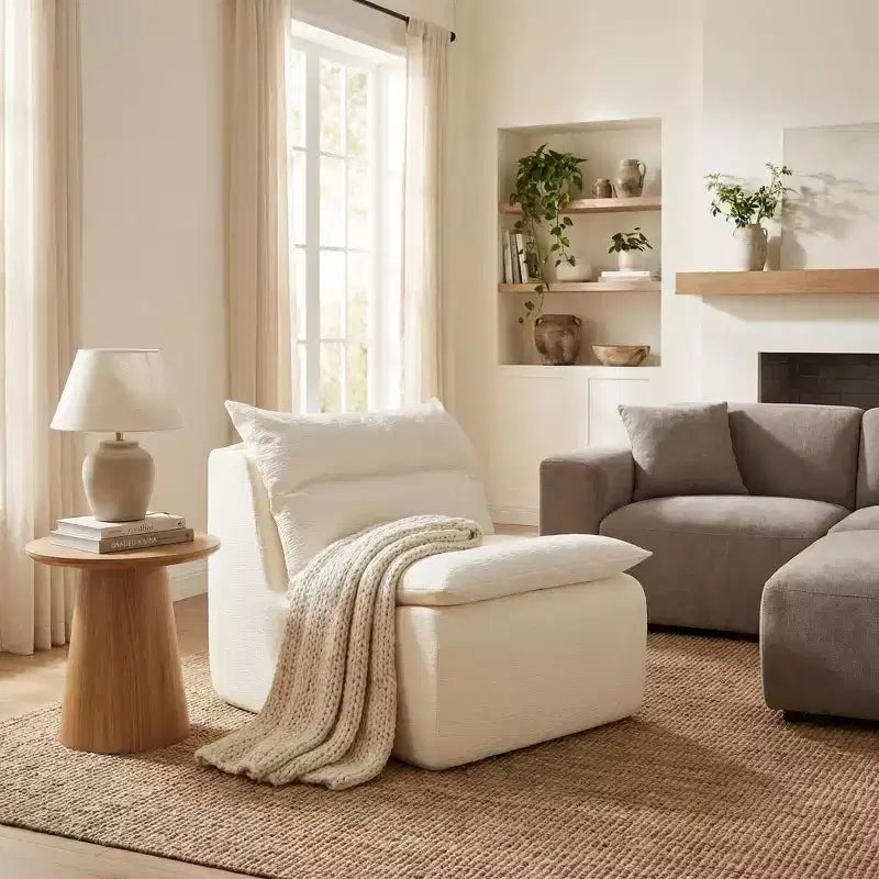 Poltrona lounge imbottita con seduta profonda