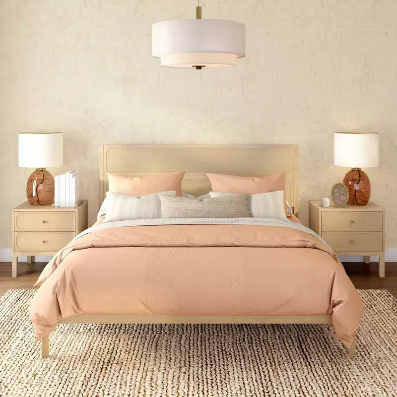 Struttura letto king in rattan con testiera