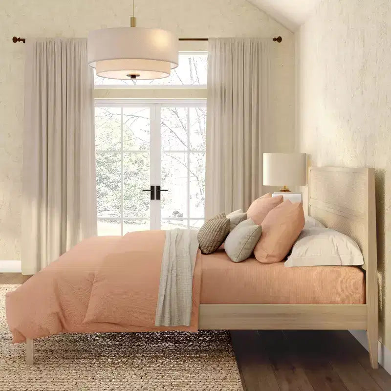 Struttura letto king in rattan con testiera